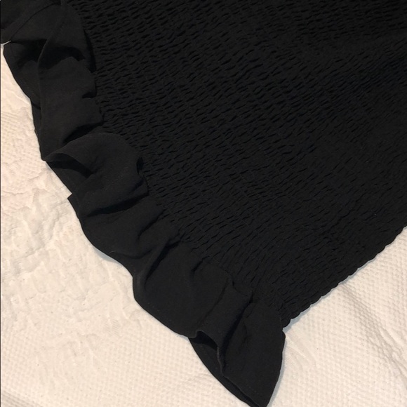 Black tube skirt with ruffle at the bottom - Picture 2 of 3